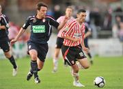23 August 2009; Mark Farren, Derry City, in action against Stuart Byrne, St Patrick's Athletic. League of Ireland Premier Division, Derry City v St Patrick's Athletic, Brandywell, Derry. Picture credit: David Maher / SPORTSFILE