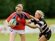 22 August 2009; Patrique Kelly, UL Bohemians, in action against Gillian Morrissey, Ballincollig. Meteor Munster Rugby Sevens Tournament, Women's Cup Final, UL Bohemians v Ballincollig, Highfield RFC, Cork. Picture credit: Diarmuid Greene / SPORTSFILE