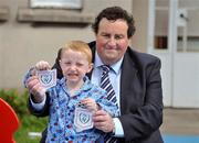 23 August 2009; Republic of Ireland Under-19 manager Sean McCaffrey with Adam Molloy, 4, from Bluebell, a patient in St Michaels Ward at Our Lady's Children's Hospital, Crumlin, for the launch of the Four Nations Tournament, which will take place in Dublin and Bray on September 5th, 6th and 8th. Proceeds from children's tickets for the Four Nations matches will be donated to the hospital. The Republic of Ireland, Holland, Portugal and Turkey will compete in the tournament. Our Lady's Children's Hospital, Crumlin, Dublin. Picture credit: Damien Eagers / SPORTSFILE