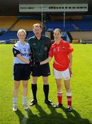 22 August 2009; The Dublin captain, Karen Halpin, and the Cork captain, Verona Ni Dhrisceoil, shake hands across the referee, John Niland, before the toss. Aisling McGing Memorial Championship Final, Cork v Dublin, Semple Stadium, Thurles, Co. Tipperary. Picture credit: Ray McManus / SPORTSFILE
