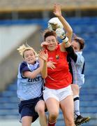 22 August 2009; Katie Sheehan, Cork, in action against Dublin players Sarah Stitch, left, and goalkeeper Deirdre Kelleher. Aisling McGing Memorial Championship Final, Cork v Dublin, Semple Stadium, Thurles, Co. Tipperary. Picture credit: Ray McManus / SPORTSFILE