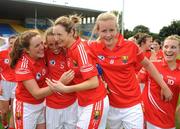 22 August 2009; Cork players Karren O'Halloran, 28, Sinead O'Leary, 5, Grainne Lucey, and Aoife Coughlan, 8, celebrate their victory over Dublin. Aisling McGing Memorial Championship Final, Cork v Dublin, Semple Stadium, Thurles, Co. Tipperary. Picture credit: Ray McManus / SPORTSFILE