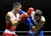 28 November 2015; Adam Courtney, left, St. Mary's Boxing Club, Co. Dublin, exchanges punches with Jason McKay, St. Paul's Boxing Club, Belfast, Co. Antrim, during their Flyweight 52kg Quarter-Final bout. IABA National Elite Male Championships. National Stadium, Dublin. Photo by Sportsfile