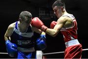 28 November 2015; Adam Courtney, right, St. Mary's Boxing Club, Co. Dublin, exchanges punches with Jason McKay, St. Paul's Boxing Club, Belfast, Co. Antrim, during their Flyweight 52kg Quarter-Final bout. IABA National Elite Male Championships. National Stadium, Dublin. Photo by Sportsfile