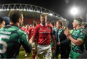 28 November 2015; Dave Foley, Munster, and Robbie Henshaw, Connacht, exchange a handshake after the game. Guinness PRO12, Round 8, Munster v Connacht. Thomond Park, Limerick. Picture credit: Diarmuid Greene / SPORTSFILE