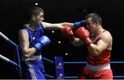 28 November 2015; Stephen Lawrence, left, Holy Family Boxing Club, Drogheda, Co. Louth, exchanges punches with Darren O'Neill, Paulstown Boxing Club, Co. Kilkenny, during their Heavyweight 91kg Quarter-Final bout. IABA National Elite Male Championships. National Stadium, Dublin. Photo by Sportsfile