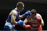 28 November 2015; Ciaran Griffin, left, Celtic Eagles Boxing Club, Co. Galway, exchanges punches with Stephen McMonagle, Holy Trinity Boxing Club, Belfast, Co. Antrim, during their Heavyweight 91kg Quarter-Final bout. IABA National Elite Male Championships. National Stadium, Dublin. Photo by Sportsfile