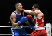 28 November 2015; Stephen McMonagle, right, Holy Trinity Boxing Club, Belfast, Co. Antrim, exchanges punches with Ciaran Griffin, Celtic Eagles Boxing Club, Co. Galway, during their Heavyweight 91kg Quarter-Final bout. IABA National Elite Male Championships. National Stadium, Dublin. Photo by Sportsfile