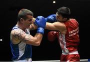 28 November 2015; Kiril Afansev, right, Smithfield Boxing Club, Co. Dublin, exchanges punches with Christy Joyce, St Michael's Boxing Club, Athy, Co. Kildare, during their Heavyweight 91kg Quarter-Final bout. IABA National Elite Male Championships. National Stadium, Dublin. Photo by Sportsfile