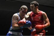 28 November 2015; Kiril Afansev, right, Smithfield Boxing Club, Co. Dublin, exchanges punches with Christy Joyce, St Michael's Boxing Club, Athy, Co. Kildare, during their Heavyweight 91kg Quarter-Final bout. IABA National Elite Male Championships. National Stadium, Dublin. Photo by Sportsfile