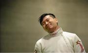 28 November 2015; Eventual third-place finisher Wei Wen Lin, Singapore, reacts to losing to Mateusz Antkiewicz, Poland, during the semi-finals of the Irish Open Fencing Championships. Loughlinstown Leisure Centre, Dun Laoghaire, Co. Dublin. Picture credit: Cody Glenn / SPORTSFILE