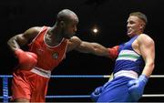 28 November 2015; Kiril Afansev, left, Smithfield Boxing Club, Co. Dublin, exchanges punches with Christy Joyce, St Michael's Boxing Club, Athy, Co. Kildare, during their Heavyweight 91kg Quarter-Final bout. IABA National Elite Male Championships. National Stadium, Dublin. Photo by Sportsfile