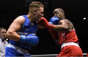 28 November 2015; Bernie O’Reilly, left, Portlaoise Boxing Club, exchanges punches with Kenneth Okungbowa, Athlone Boxing Club, during their Heavyweight 91kg Quarter-Final bout. IABA National Elite Male Championships. National Stadium, Dublin. Photo by Sportsfile