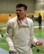 28 November 2015; Eventual third-place finisher Wei Wen Lin, Singapore, celebrates after qualifying for the final four of the Irish Open Fencing Championships. Loughlinstown Leisure Centre, Dun Laoghaire, Co. Dublin. Picture credit: Cody Glenn / SPORTSFILE