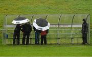 29 November 2015; Members of the TG4 team take shelter ahead of the game. AIB Munster GAA Senior Club Football Championship Final, Nemo Rangers v Clonmel Commercials. Mallow GAA Grounds, Mallow, Co. Cork. Picture credit: Piaras Ó Mídheach / SPORTSFILE