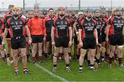 29 November 2015; Oulart the Ballagh players during the national anthem ahead of the AIB Leinster GAA Senior Club Hurling Championship Final match between Oulart the Ballagh and Cuala at Netwatch Dr Cullen Park in Carlow. Photo by David Maher/Sportsfile