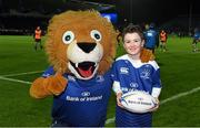 27 November 2015; Leinster matchday mascots Alex Woulfe, from Clontarf, Dublin, with Leo The Lion ahead of Leinster v Ulster - Guinness PRO12, Round 8. RDS, Ballsbridge, Dublin. Picture credit: Stephen McCarthy / SPORTSFILE