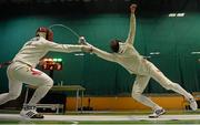 28 November 2015; Mateusz Antkiewicz, Poland, right, in action against Wei Wen Lin, Singapore, in their semi-final contest in which Antkiewicz won during the Irish Open Fencing Championships. Loughlinstown Leisure Centre, Dun Laoghaire, Co. Dublin. Picture credit: Cody Glenn / SPORTSFILE