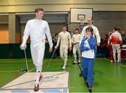 28 November 2015; Eventual winner Bas Vervuijlen, The Netherlands, enters the gym during the Irish Open Fencing Championships alongside youth member of the Pembroke Fencing Club Leon Gautier Loftous, 8. Loughlinstown Leisure Centre, Dun Laoghaire, Co. Dublin. Picture credit: Cody Glenn / SPORTSFILE