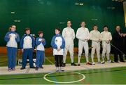 28 November 2015; Members of the Pembroke Fencing Club, from left, Dasha Lee, 11, Matteo Sanvito, 10, Leon Gautier Loftous, 8, and Claudio Sosa, 11, were recognized before the final alongside the four finalists, Uros Balant, Slovenia, eventual winner Bas Vervuijlen, The Netherlands, Mateusz Antkiewicz, Poland, and Wei Wen Lin, Singaporte during the Irish Open Fencing Championships. Loughlinstown Leisure Centre, Dun Laoghaire, Co. Dublin. Picture credit: Cody Glenn / SPORTSFILE