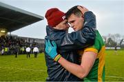 29 November 2015; Michael Quinlivan, Clonmel Commercials, celebrates with his father Martin after the game. AIB Munster GAA Senior Club Football Championship Final, Nemo Rangers v Clonmel Commercials. Mallow GAA Grounds, Mallow, Co. Cork. Picture credit: Piaras Ó Mídheach / SPORTSFILE