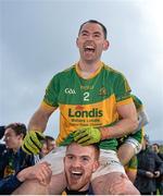 29 November 2015; Fergal Condon, top, and Shane Taylor, Clonmel Commercials, celebrate after the game. AIB Munster GAA Senior Club Football Championship Final, Nemo Rangers v Clonmel Commercials. Mallow GAA Grounds, Mallow, Co. Cork. Picture credit: Piaras Ó Mídheach / SPORTSFILE