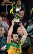 29 November 2015; Clonmel Commercials captain Kevin Harney lifts the cup after the game. AIB Munster GAA Senior Club Football Championship Final, Nemo Rangers v Clonmel Commercials. Mallow GAA Grounds, Mallow, Co. Cork. Picture credit: Piaras Ó Mídheach / SPORTSFILE