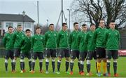 30 November 2015; Republic of Ireland players led by team captain Darragh Leahy stand for the National Anthem. U18 International Friendly, Republic of Ireland v Czech Republic. Home Farm FC, Whitehall, Dublin. Picture credit: Matt Browne / SPORTSFILE