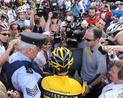 25 August 2009; Seven times winner of the Tour de France Lance Armstrong is the cente of attention before being joined by cycling fans for a ride in the Phoenix Park, Dublin. Picture credit: Stephen McCarthy / SPORTSFILE