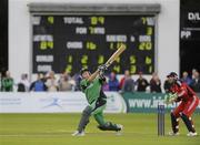 27 August 2009; Trent Johnston, Ireland, hits a boundry against  England. One Day Cricket International, Ireland v England, Stormont, Belfast, Co. Antrim. Picture credit: Oliver McVeigh / SPORTSFILE