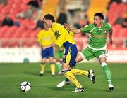 29 August 2009; Ciaran Caldwell, Cliftonville, in action against Billy Dennehy, Cork City. Setanta Cup, Cork City v Cliftonville, Turner's Cross, Cork. Picture credit: David Maher / SPORTSFILE