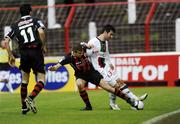 29 August 2009; Conor Powell, Bohemians, tackles Keith Gillespie, Glentoran. Setanta Cup, Glentoran v Bohemians, The Oval, Belfast. Picture credit: Oliver McVeigh / SPORTSFILE