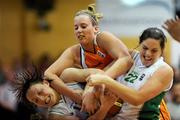 29 August 2009; Lindsay Peat, left, and Marie Breen, Ireland, in action against Leonie Kooij, Netherlands. Senior Women's Basketball European Championship Qualifier, Ireland v Netherlands, National Basketball Arena, Tallaght, Dublin. Photo by Sportsfile