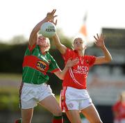 29 August 2009; Claire Egan, left, Mayo, and Juliet Murphy, Cork, contest a kick out. TG4 All-Ireland Ladies Football Senior Championship Semi-Final, Cork v Mayo, McDonagh Park, Nenagh, Co. Tipperary. Picture credit: Brendan Moran / SPORTSFILE