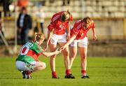 29 August 2009; Cork players Juliet Murphy and Geraldine O'Flynn, right, shake hands with Mayo's Lisa Cafferkey after the final whistle. TG4 All-Ireland Ladies Football Senior Championship Semi-Final, Cork v Mayo, McDonagh Park, Nenagh, Co. Tipperary. Picture credit: Brendan Moran / SPORTSFILE