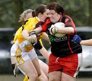 29 August 2009; Derry's goalkeeper Breigeen Cassidy, in action against Mary McCann, Antrim. TG4 All-Ireland Ladies Football Junior Championship Semi-Final, Antrim v Derry, Wolfe Tones GAA Club, Kildress, Co. Tyrone. Picture credit: Michael Cullen / SPORTSFILE