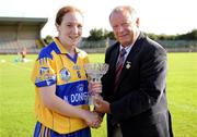29 August 2009; Louise Henchy, Clare, is presented with the Player of the Match by Pat Quill, President, Cumann Peil Gael na mBan. TG4 All-Ireland Ladies Football Intermediate Championship Semi-Final, Clare v Waterford, McDonagh Park, Nenagh, Co. Tipperary. Picture credit: Brendan Moran / SPORTSFILE