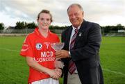 29 August 2009; Briege Corkery, Cork, is presented with the Player of the Match by Pat Quill, President, Cumann Peil Gael na mBan. TG4 All-Ireland Ladies Football Senior Championship Semi-Final, Cork v Mayo, McDonagh Park, Nenagh, Co. Tipperary. Picture credit: Brendan Moran / SPORTSFILE