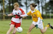 29 August 2009; Bronagh McClenaghan, Antrim, in action against Julie McLaughlin, Derry. TG4 All-Ireland Ladies Football Junior Championship Semi-Final, Antrim v Derry, Wolfe Tones GAA Club, Kildress, Co. Tyrone. Picture credit: Michael Cullen / SPORTSFILE