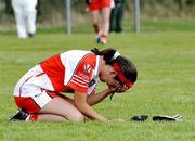 29 August 2009; A dejected Dervla McMaster, Derry, after the game. TG4 All-Ireland Ladies Football Junior Championship Semi-Final, Antrim v Derry, Wolfe Tones GAA Club, Kildress, Co. Tyrone. Picture credit: Michael Cullen / SPORTSFILE