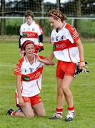 29 August 2009; Kathy Conway, 8, Derry, consoles Dervla McMaster after the game. TG4 All-Ireland Ladies Football Junior Championship Semi-Final, Antrim v Derry, Wolfe Tones GAA Club, Kildress, Co. Tyrone. Picture credit: Michael Cullen / SPORTSFILE