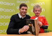 3 December 2015; Steven Gerrard with six year old Liverpool fan Oran Waters from Blanchardstown, Co. Dublin, at Eason, O’Connell Street, where he was signing copies of his latest book, “My Story”. Eason, O'Connell Street, Dublin. Picture credit: Matt Browne / SPORTSFILE