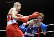 4 December 2015; Regan Buckley, St Teresa's Boxing Club, Co. Wicklow, left, exchanges punches with Darryl Moran, Illies Golden Gloves Boxing Club, Buncrana, Co. Donegal, during their 49kg semi-final bout. IABA National Elite Championships, National Boxing Stadium, Dublin. Picture credit: Piaras Ó Mídheach / SPORTSFILE