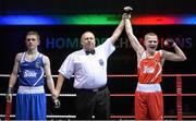 4 December 2015; Regan Buckley, St Teresa's Boxing Club, Co. Wicklow, right, reacts after beating Darryl Moran, Illies Golden Gloves Boxing Club, Buncrana, Co. Donegal, during their 49kg semi-final bout. IABA National Elite Championships, National Boxing Stadium, Dublin. Picture credit: Piaras Ó Mídheach / SPORTSFILE