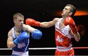 4 December 2015; Adam Nolan, St Fergals Bray, Co. Wicklow, right, exchanges punches with Michael Bustard, Monkstown Boxing Club, Co. Antrim, during their 69kg semi-final bout. IABA National Elite Championships, National Boxing Stadium, Dublin. Picture credit: Piaras Ó Mídheach / SPORTSFILE
