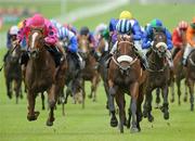 30 August 2009; Song Of My Heart, left, with Wayne Lordan up, on their way to winning the AES Recycling European Breeders Fund Maiden from second place Mujaazef with Declan McDonogh. The Curragh Racecourse, Co. Kildare. Picture credit: Matt Browne / SPORTSFILE