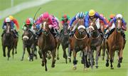 30 August 2009; Song Of My Heart, left in pink, with Wayne Lordan up, on their way to winning the AES Recycling European Breeders Fund Maiden from second place Mujaazef with Declan McDonogh. The Curragh Racecourse, Co. Kildare. Picture credit: Matt Browne / SPORTSFILE