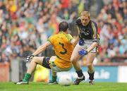 30 August 2009; Colm Cooper, Kerry, goes down under the challenge of Anthony Moyles, Meath, to win his side a penalty. GAA All-Ireland Senior Football Championship Semi-Final, Kerry v Meath, Croke Park, Dublin. Picture credit: Pat Murphy / SPORTSFILE