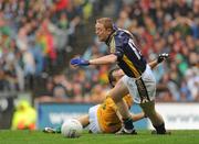 30 August 2009; Colm Cooper, Kerry, goes down under the challenge of Anthony Moyles, Meath, to win his side a penalty. GAA All-Ireland Senior Football Championship Semi-Final, Kerry v Meath, Croke Park, Dublin. Picture credit: Pat Murphy / SPORTSFILE
