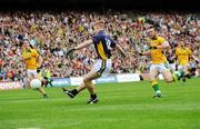 30 August 2009; Kerry's Tommy Walsh shoots to score his side's second goal as Meath's Michael Burke can only look on. GAA All-Ireland Senior Football Championship Semi-Final, Kerry v Meath, Croke Park, Dublin. Picture credit: Brian Lawless / SPORTSFILE